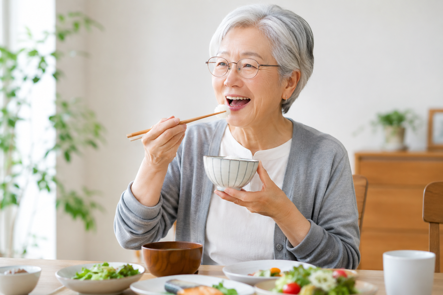 インプラントでおいしく食事を楽しむイメージ